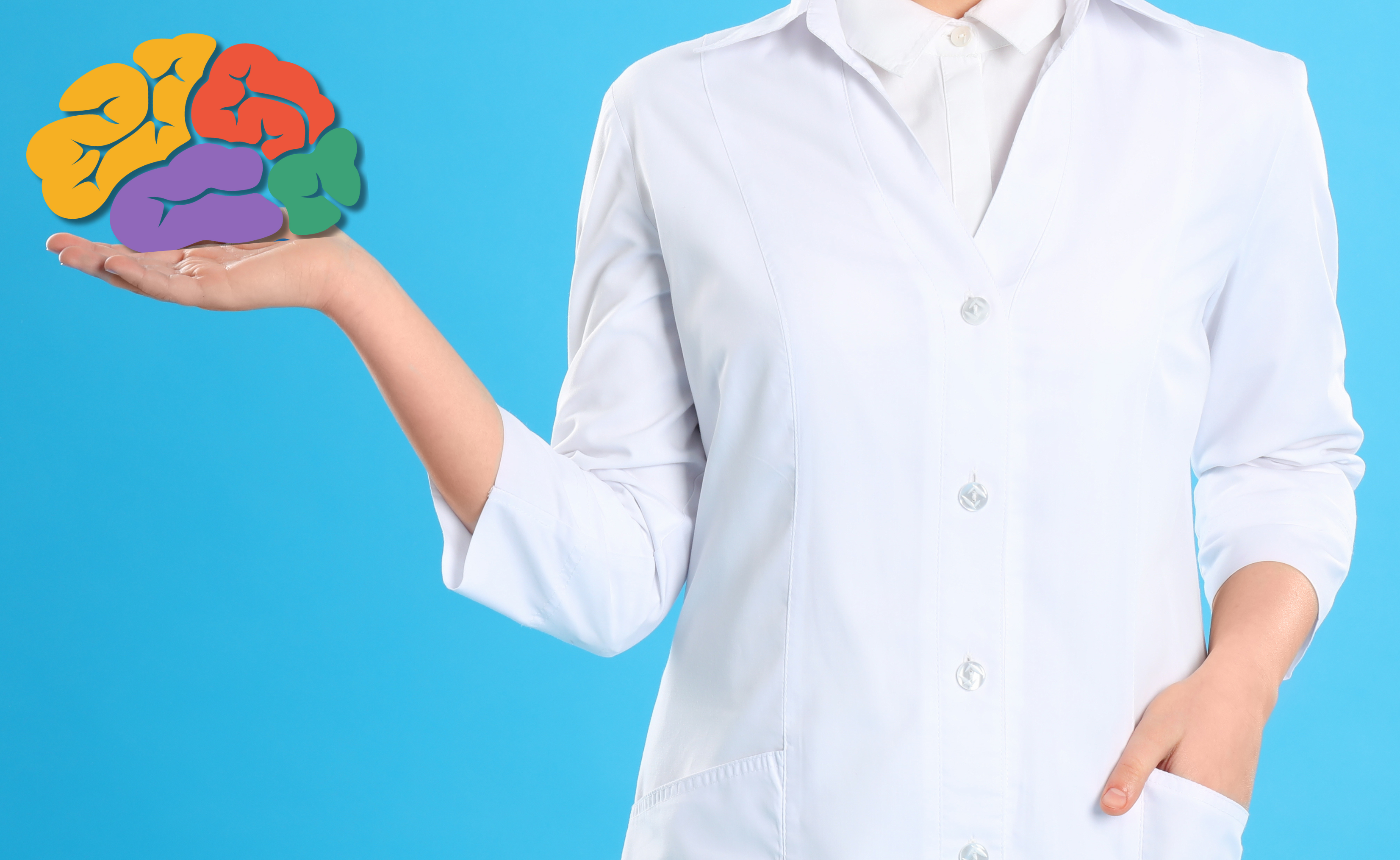 Researcher in a white lab coat holding a brain