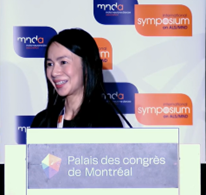 A photo of Dr Rachel Tan giving her talk at the symposium.